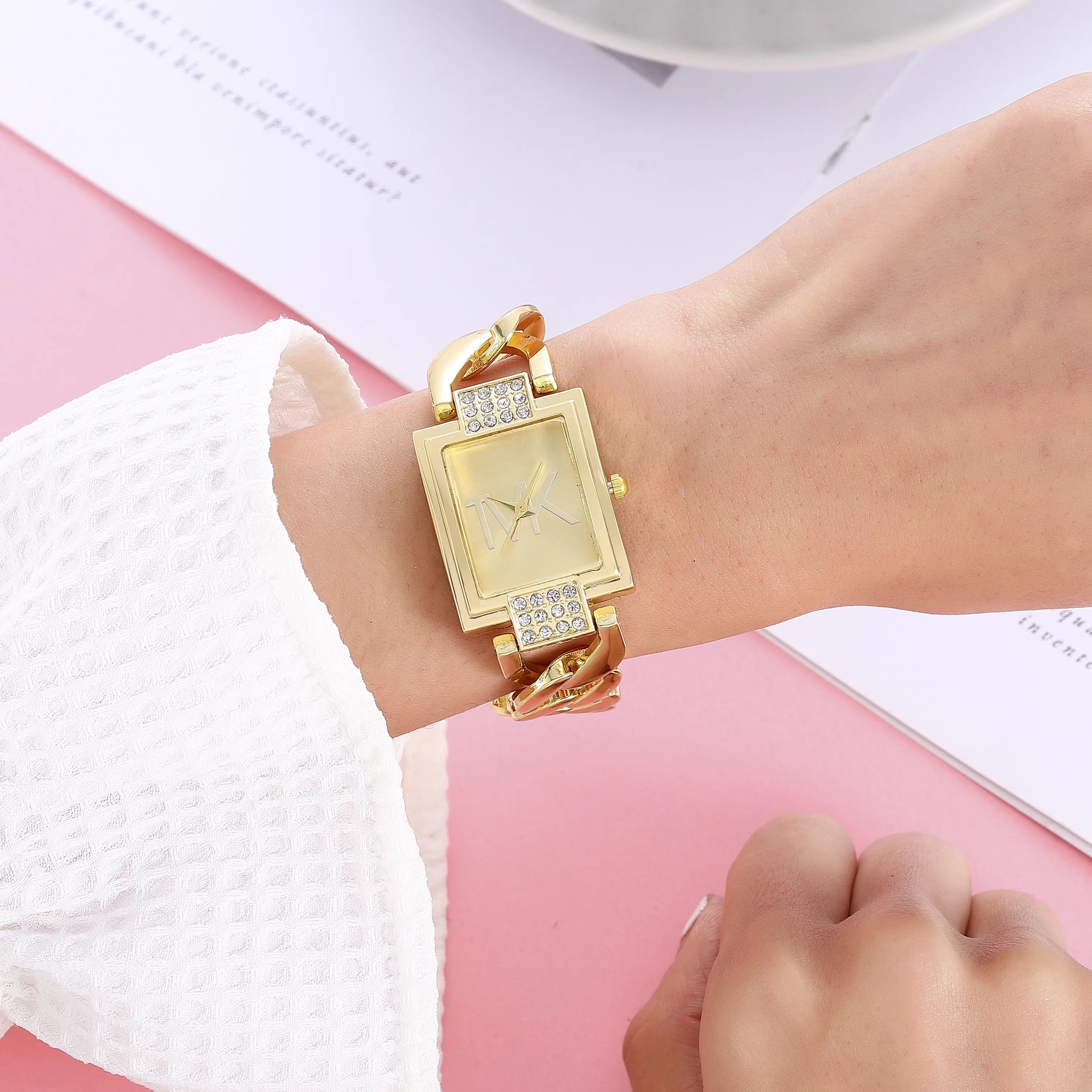 Elegant women's luxury watch by Lamp Post featuring a black square face, metal strap, and trendy quartz movement.