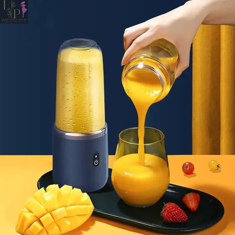 Pink portable juicer blender from Lamp Post with a compact design, perfect for on-the-go smoothies and fresh juice.