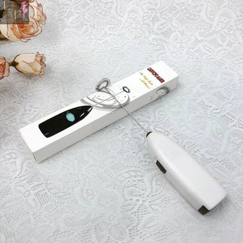 White Lamp Post mini electric coffee blender and handheld egg whisk mixer for drinks and milk, compact and easy to use.