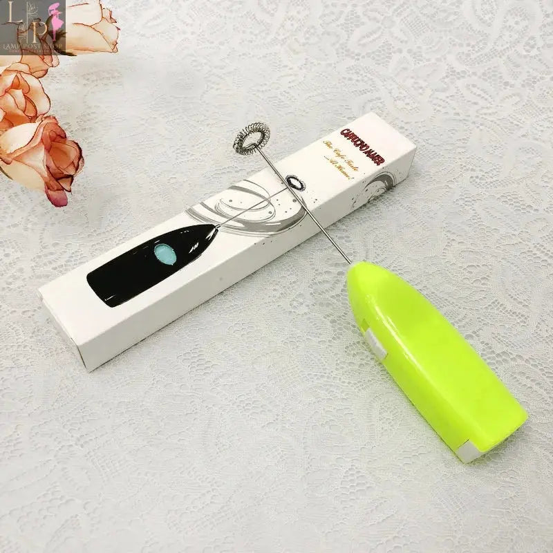 Lamp Post white mini electric coffee blender and handheld egg whisk mixer for drinks and milk, compact and portable kitchen appliance.