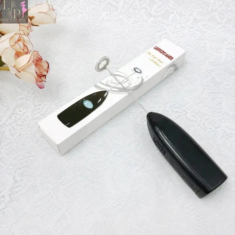 White Lamp Post Mini Electric Coffee Blender and Handheld Egg Whisk Mixer for drinks and milk, compact kitchen appliance.