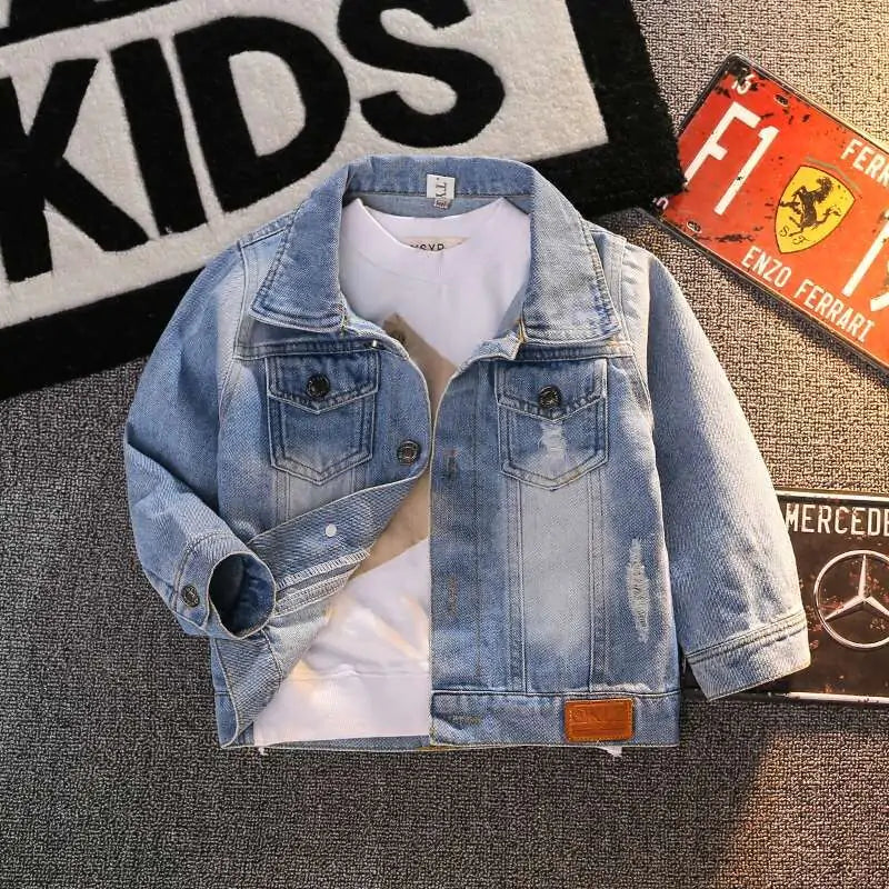 Men's blue denim jacket by Lamp Post with classic design, visible stitching, and button front, shown on a hanger.