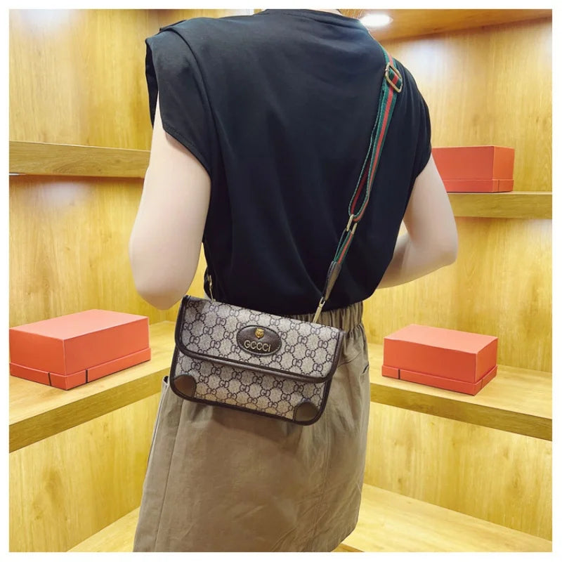 Lamp Post brown geometric print quilted shoulder bag with metal logo, lightweight PU material, flap closure, magnetic snap, and adjustable strap.