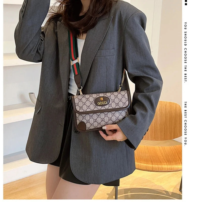 Lamp Post brown quilted shoulder bag with geometric print, metal logo, adjustable strap, flap closure, and magnetic snap.