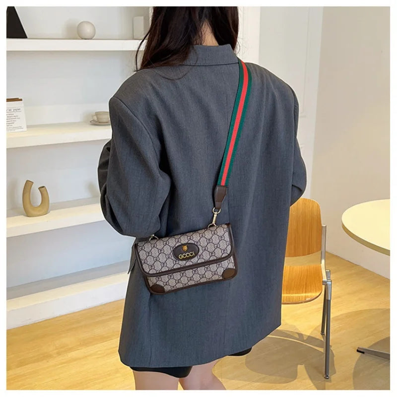 Lamp Post brown quilted geometric print shoulder bag with metal logo, adjustable strap, magnetic flap, lightweight PU material, crossbody style.