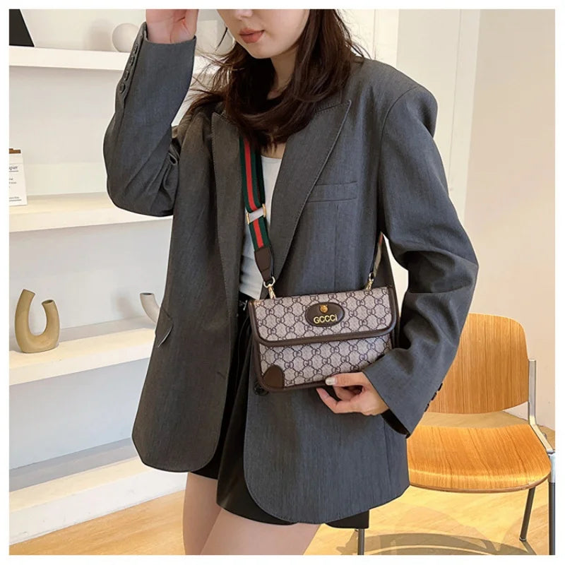Lamp Post brown quilted geometric print shoulder bag with metal logo, adjustable strap, magnetic flap, and lightweight PU material.