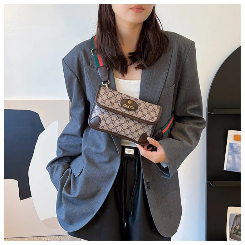Lamp Post brown geometric print quilted shoulder bag with metal logo, lightweight PU material, flap closure, and adjustable crossbody strap.