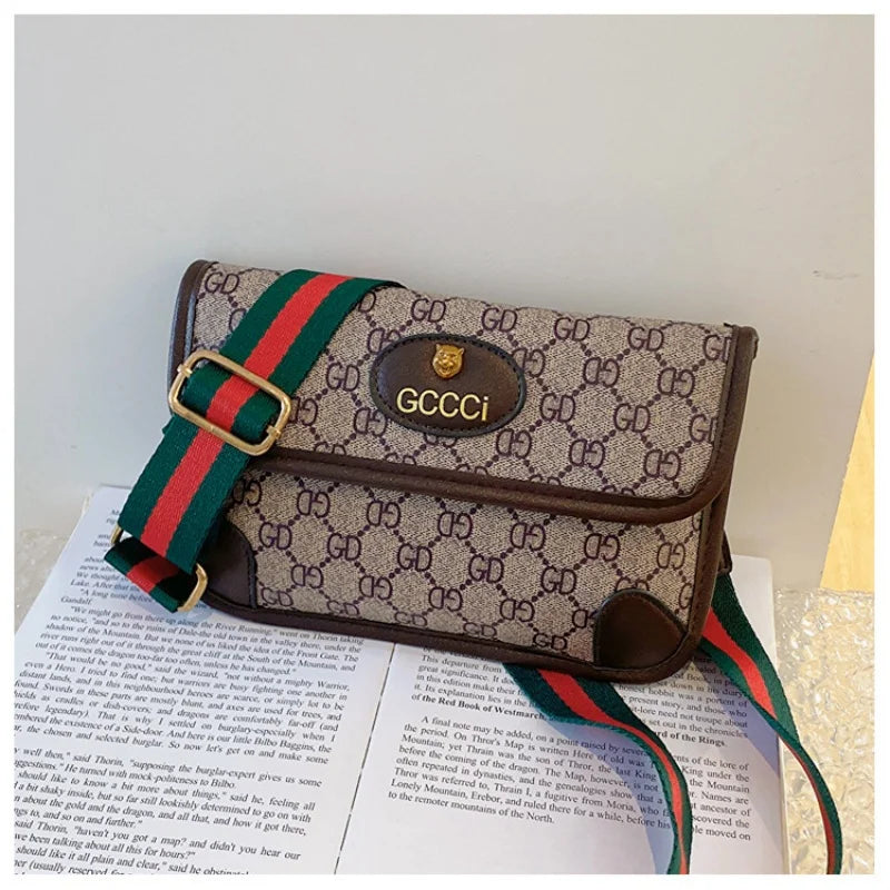 Lamp Post brown quilted shoulder bag with geometric print, metal logo, adjustable strap, flap closure, and magnetic snap.