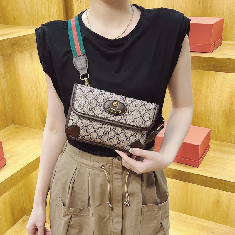 Lamp Post geometric print quilted shoulder bag with metal logo, lightweight PU material, flap closure, magnetic snap, and adjustable crossbody strap.