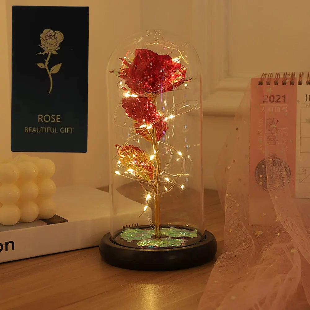 Red fairy lights in a glass dome by Lamp Post, perfect for Valentine's Day, wedding, or party decoration.
