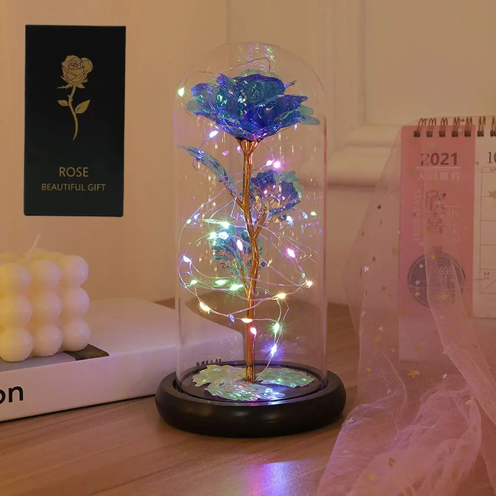 Red fairy lights in a glass dome by Lamp Post, perfect for Valentine's Day, wedding, or party decor.