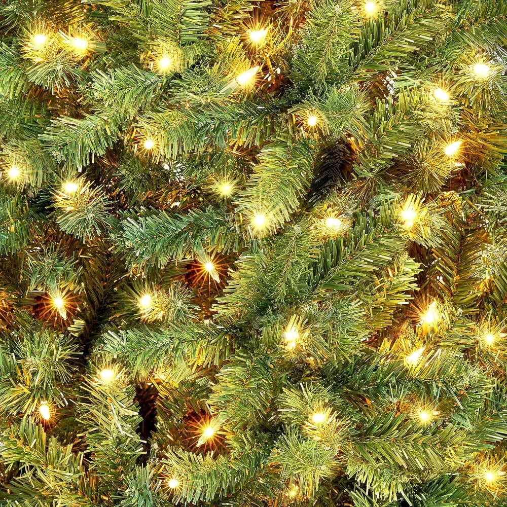 12ft green Christmas tree decoration by Lamp Post with 1500 lights, perfect for holiday decor in the United States.