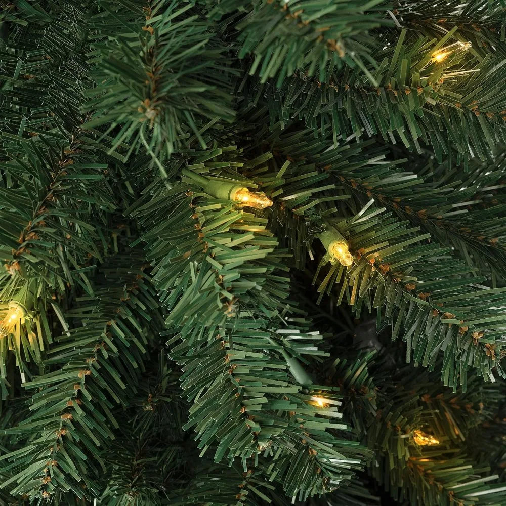 Lamp Post 4.5-ft artificial Christmas tree with 1102 branch tips, 350 warm lights, metal stand, slim pencil shape, realistic decoration