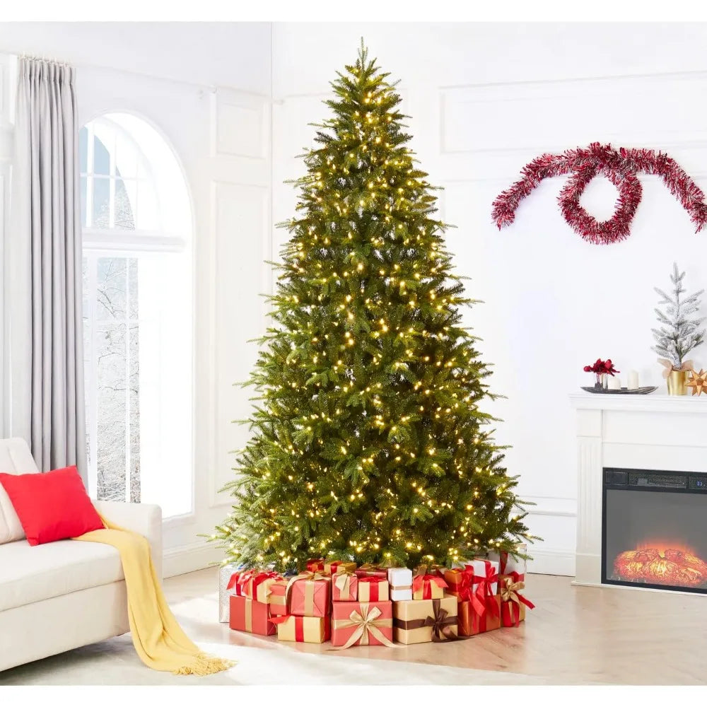 Lamp Post 9-foot slim Christmas tree decorated with 900 warm lights and a metal stand for holiday decoration.