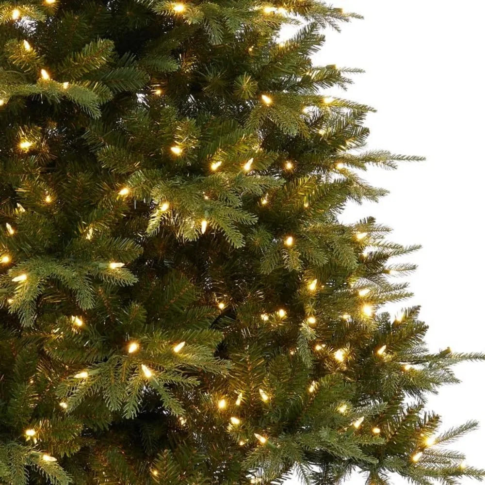 Lamp Post 9-foot slim Christmas tree decorated with 900 warm lights on a metal stand, perfect for holiday decoration.