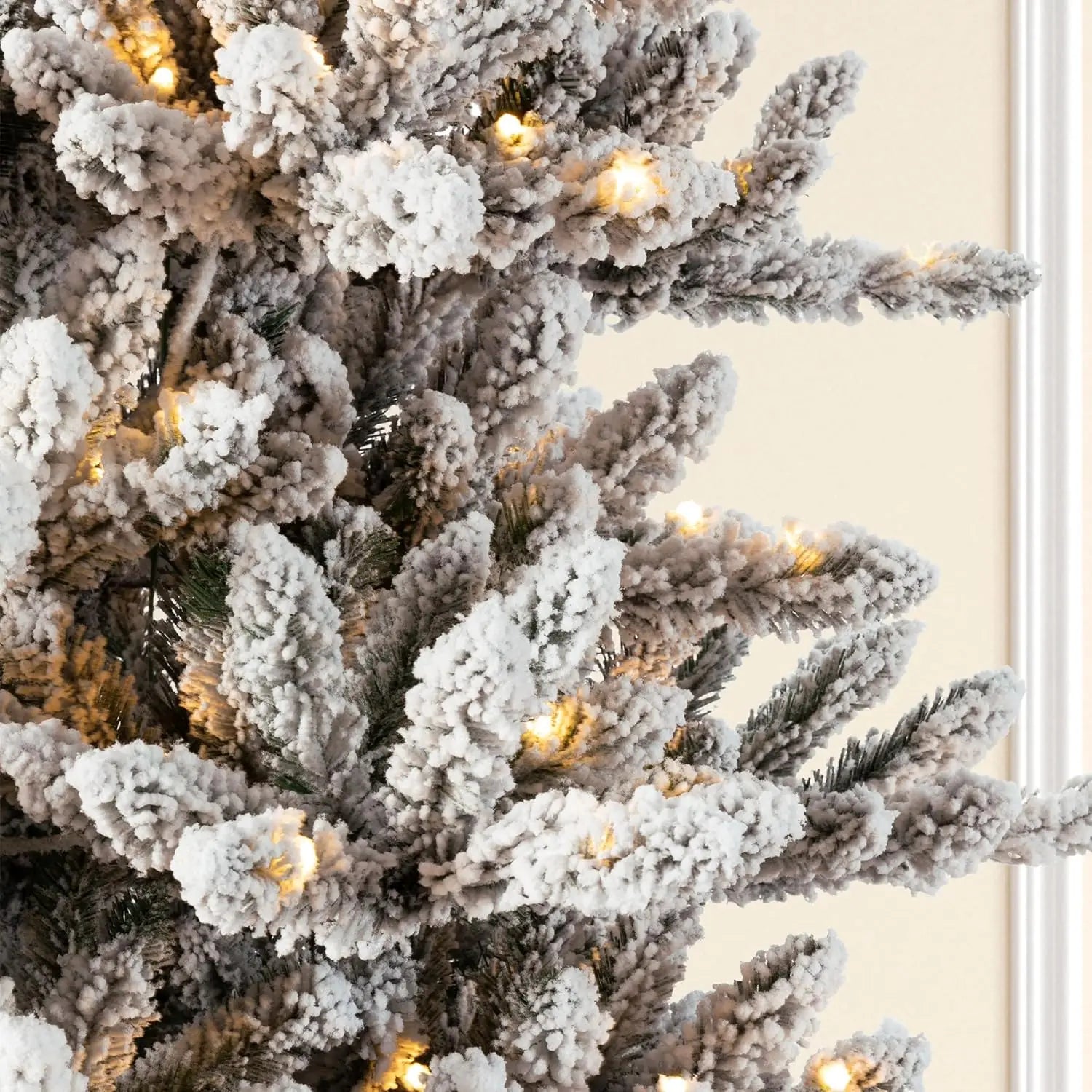 9 ft pre-lit Christmas tree decoration by Lamp Post, showcasing a tall, festive holiday tree with lights and ornaments.