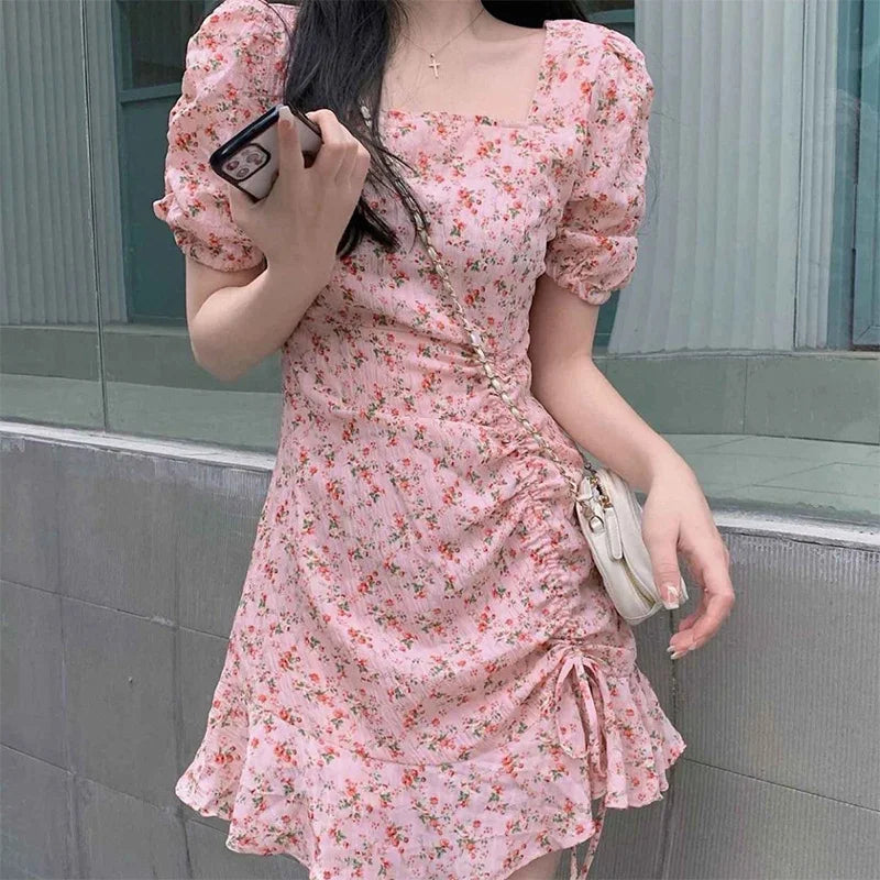 Pink short sleeve summer women’s clothing by Lamp Post, displayed on a mannequin with a casual, lightweight fabric.