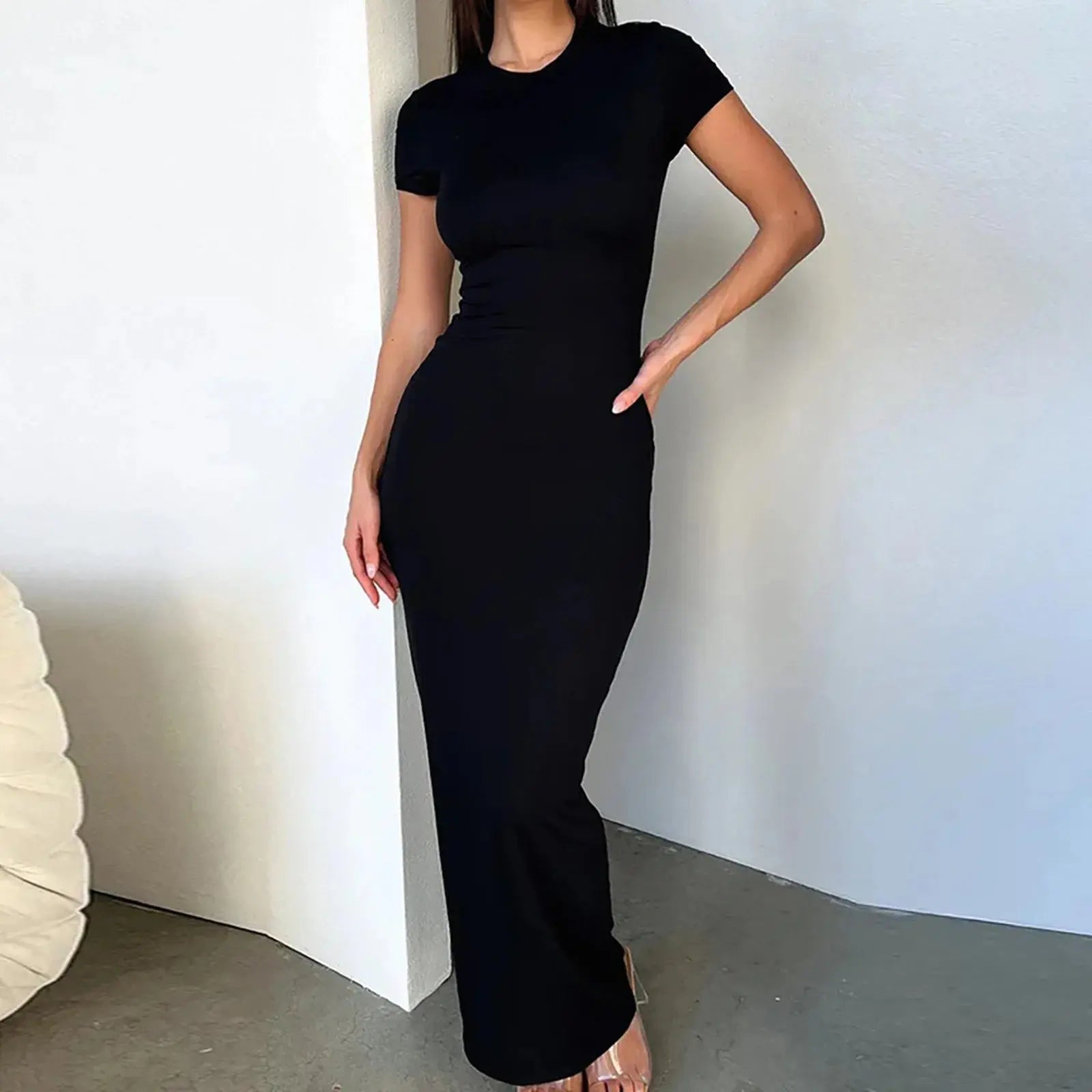 Black women's summer maxi T-shirt dress by Lamp Post, casual slim bodycon style, simple and comfortable for everyday wear.