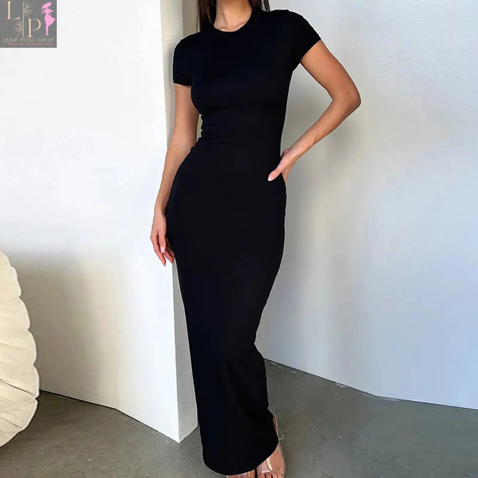 Black women's summer maxi T-shirt dress by Lamp Post, casual bodycon style with a simple, slim fit design.