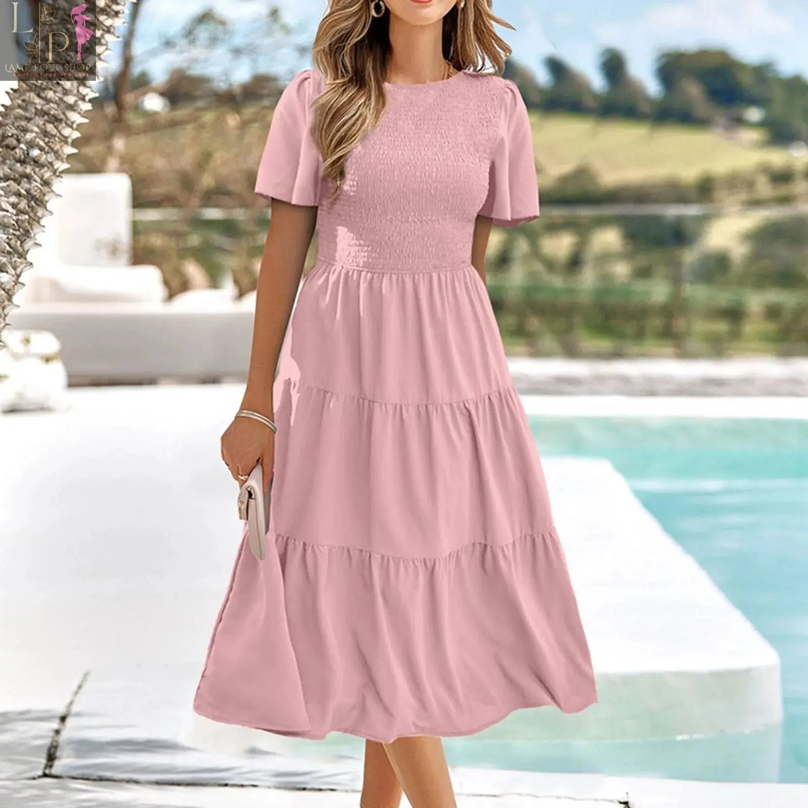 Green summer dress for women by Lamp Post, casual midi style with flutter short sleeves and V-neck, perfect for warm weather.