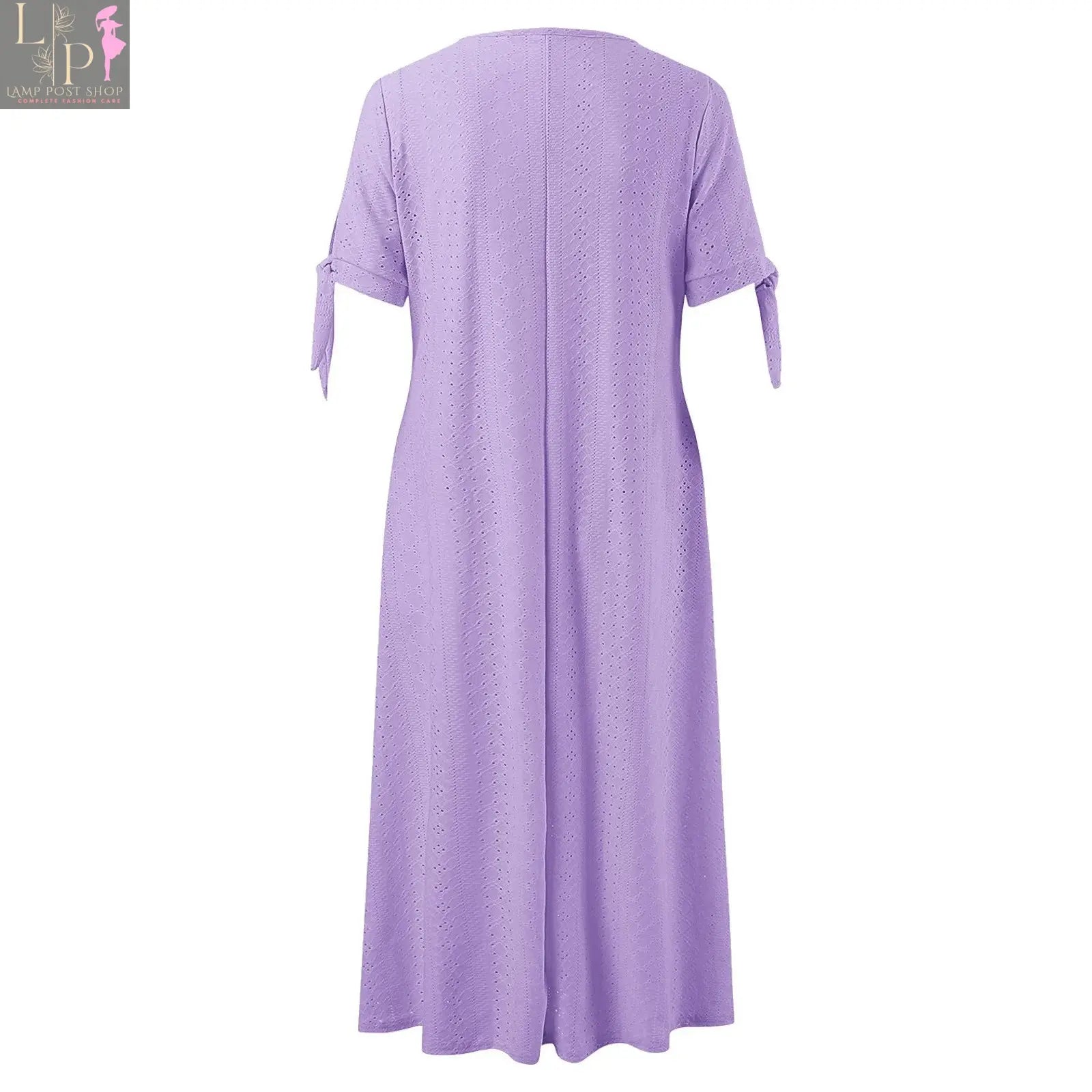 Elegant white party dress for ladies by Lamp Post with hollow-out design, bow accents, short sleeves, lace waist, and pockets.