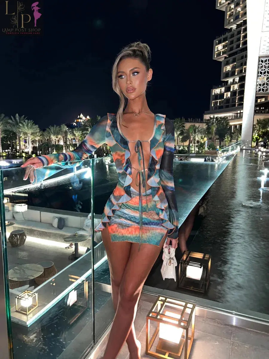 Orange mini women's dress by Lamp Post featuring a deep V-neck, lace-up front, long sleeves, split design, perfect for summer beach or parties.