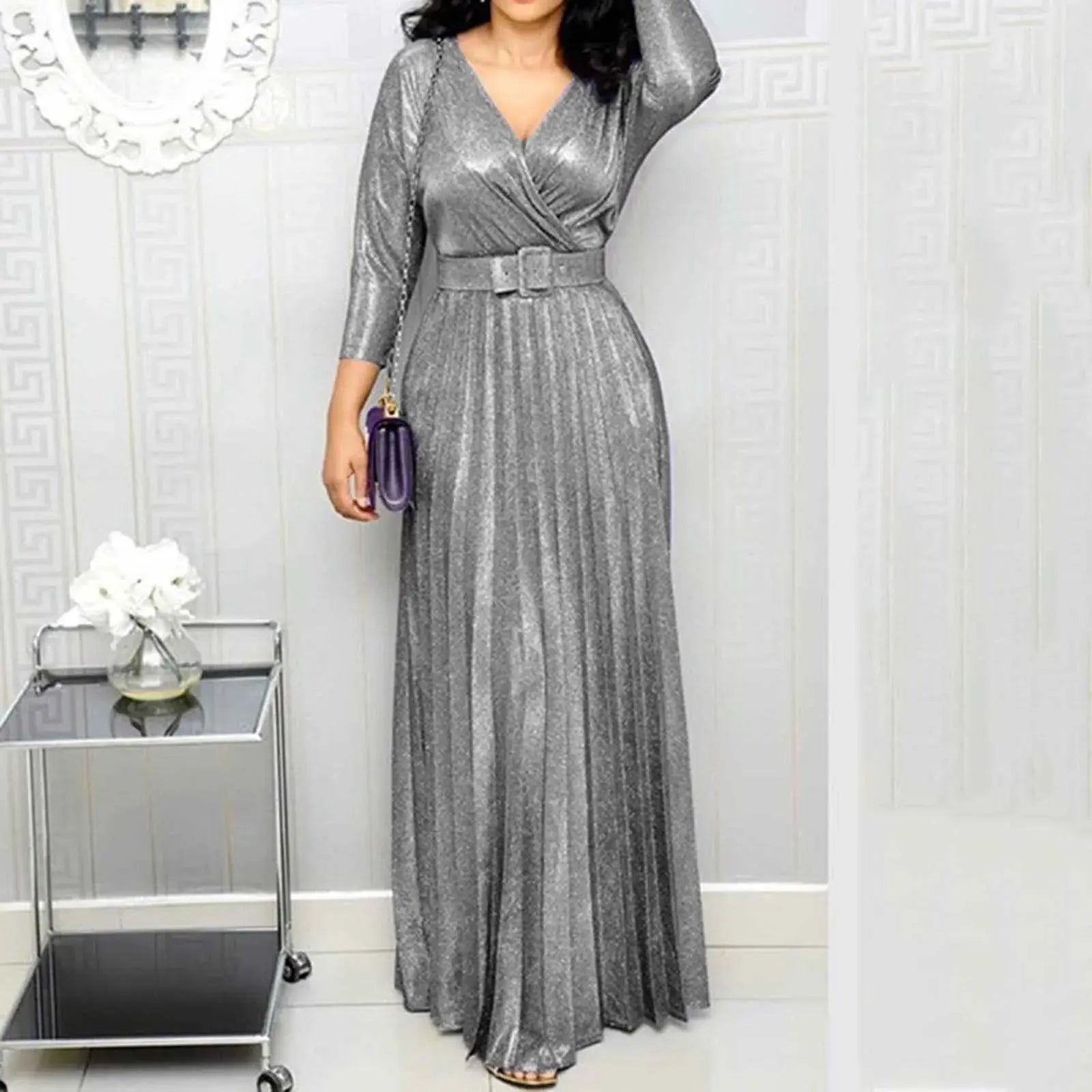 Elegant black party dress from Lamp Post, stylish clothing with a silver accent, perfect for formal events or celebrations.
