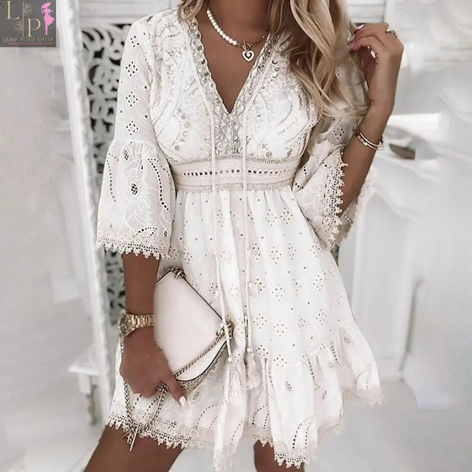 White lace crochet summer dress for women, short sleeve beach sundress, by Lamp Post, made of lightweight cotton.