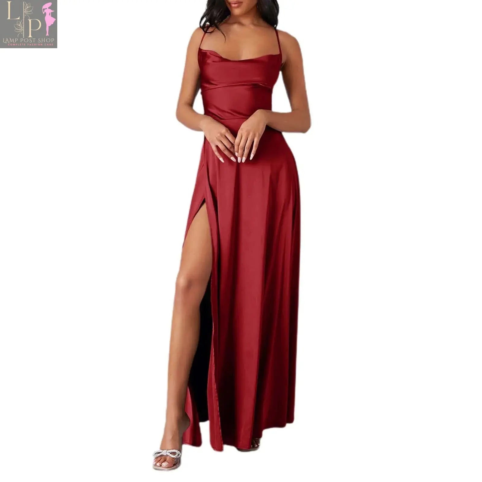 Women’s white sleeveless summer dress by Lamp Post featuring pleated design, backless style, and lace-up details.