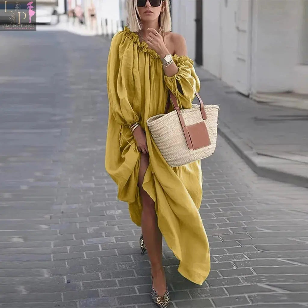 Plus size yellow off-shoulder boho maxi dress by Lamp Post, casual vintage sundress ideal for bridesmaids or cocktail parties.