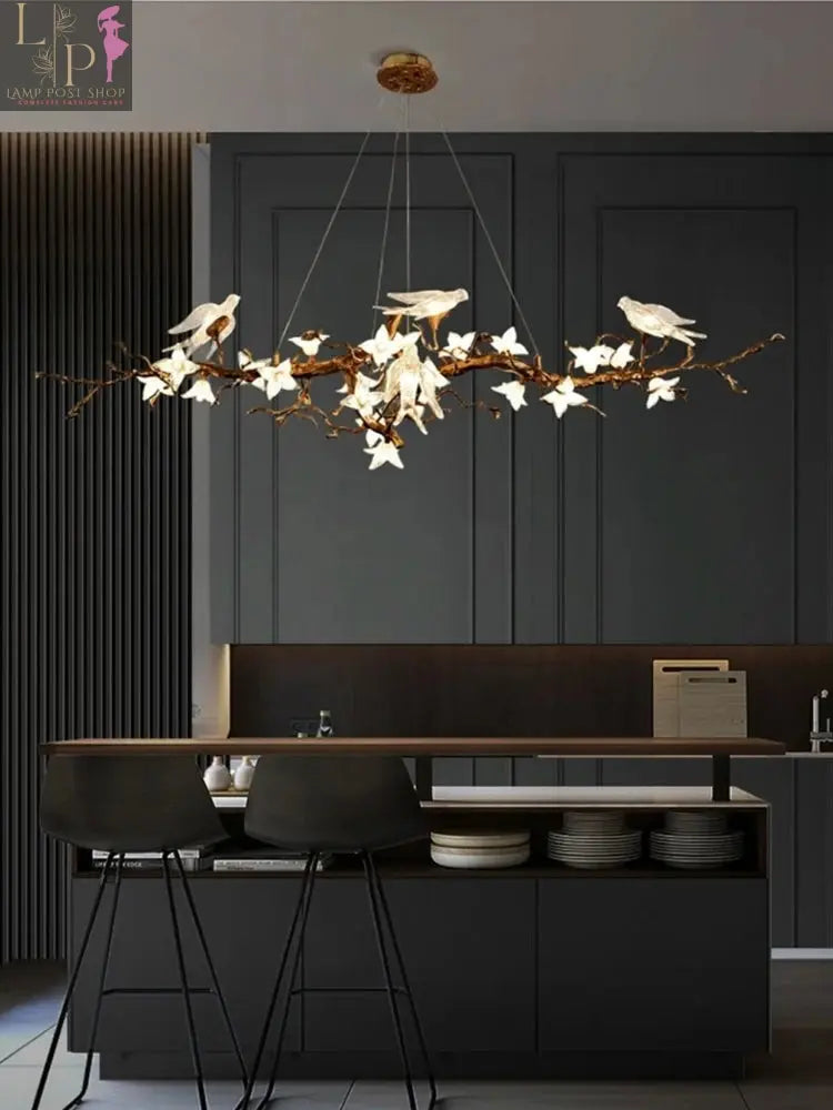LED copper chandelier by Lamp Post featuring swallow and branch-inspired design, ideal for luxury restaurants and living rooms.