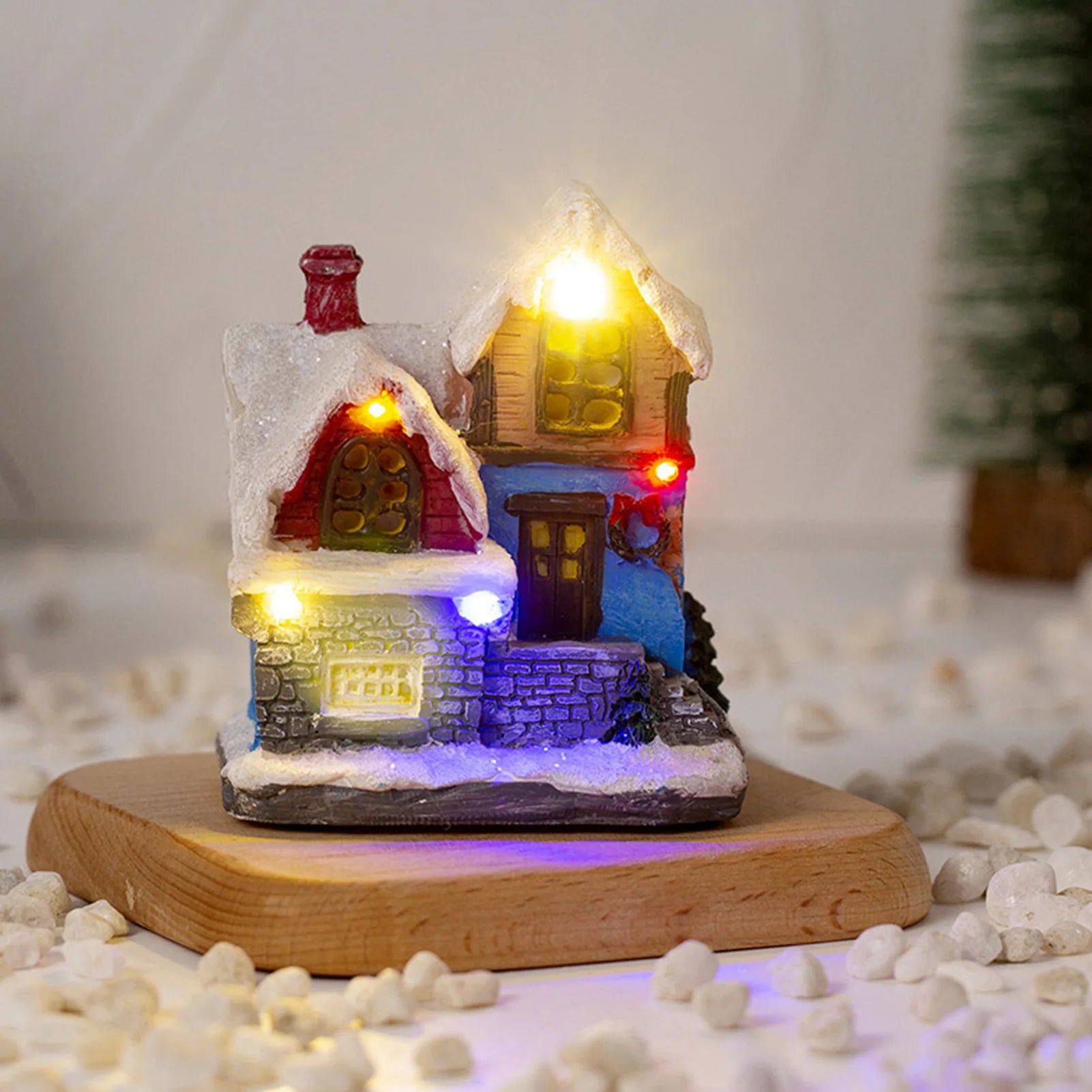 LED Christmas decoration featuring a snow house with lights, by Lamp Post, perfect for festive holiday decor.