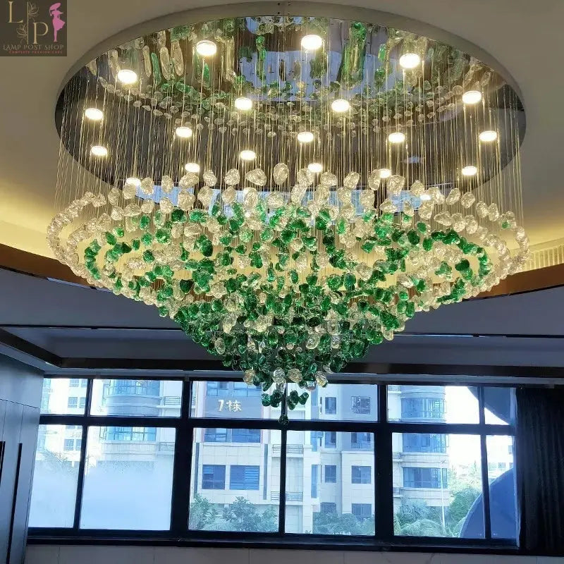 Large crystal LED chandelier by Lamp Post featuring a gradient stone design, perfect for luxurious staircase ceiling lighting.