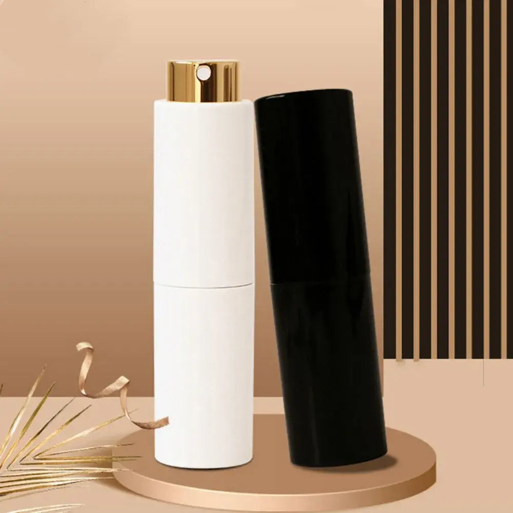 Refillable portable mini women’s perfume glass bottle by Lamp Post, compact and stylish for on-the-go fragrance application.