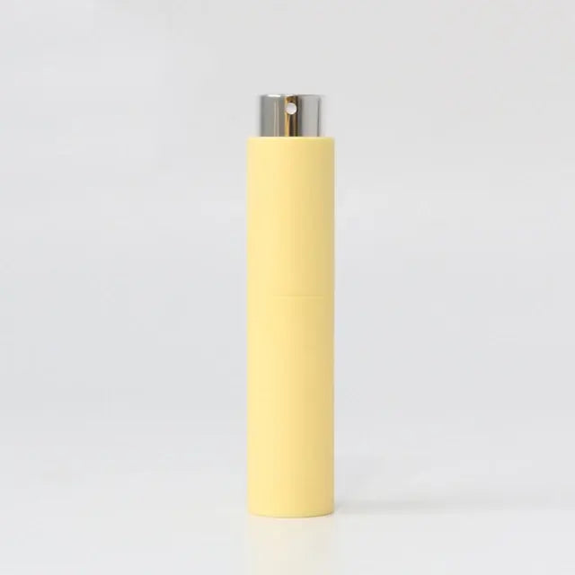Refillable portable mini women’s perfume glass bottle by Lamp Post, compact and stylish for on-the-go fragrance.