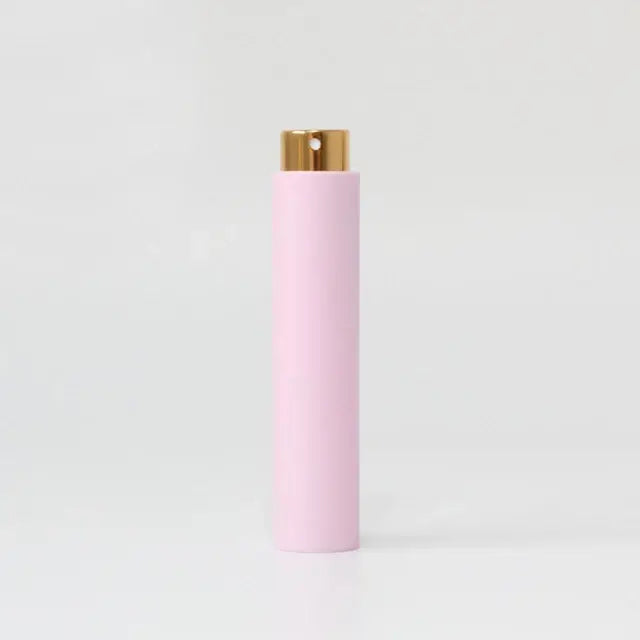 Portable mini women’s perfume glass bottle by Lamp Post, refillable and compact for easy carry and fragrance on the go.