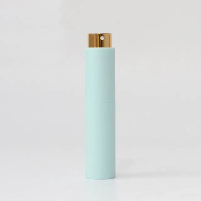 Refillable portable mini women’s perfume glass bottle by Lamp Post, compact and stylish for on-the-go fragrance use.