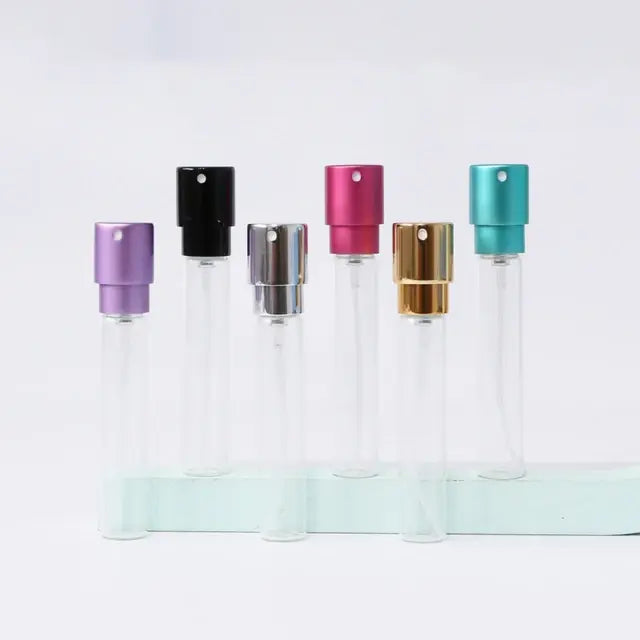 Refillable portable mini women’s perfume glass bottle by Lamp Post, compact and elegant for on-the-go fragrance.