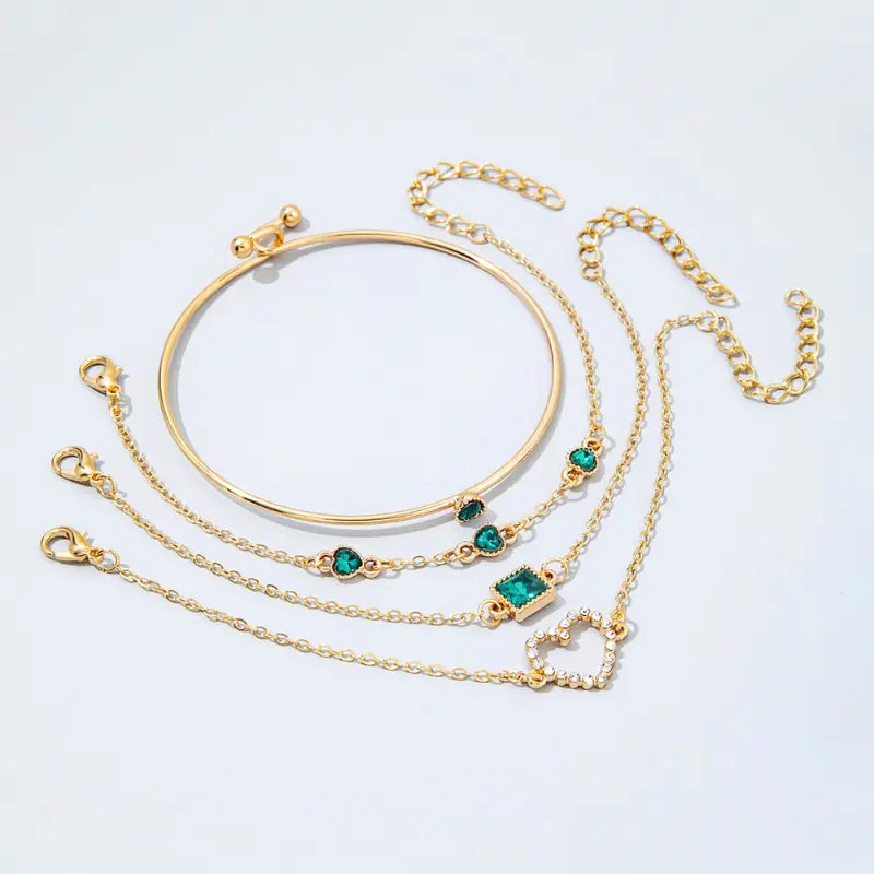 Gold inlaid bracelet jewelry set by Lamp Post featuring elegant, intricate design and matching pieces for a sophisticated look.