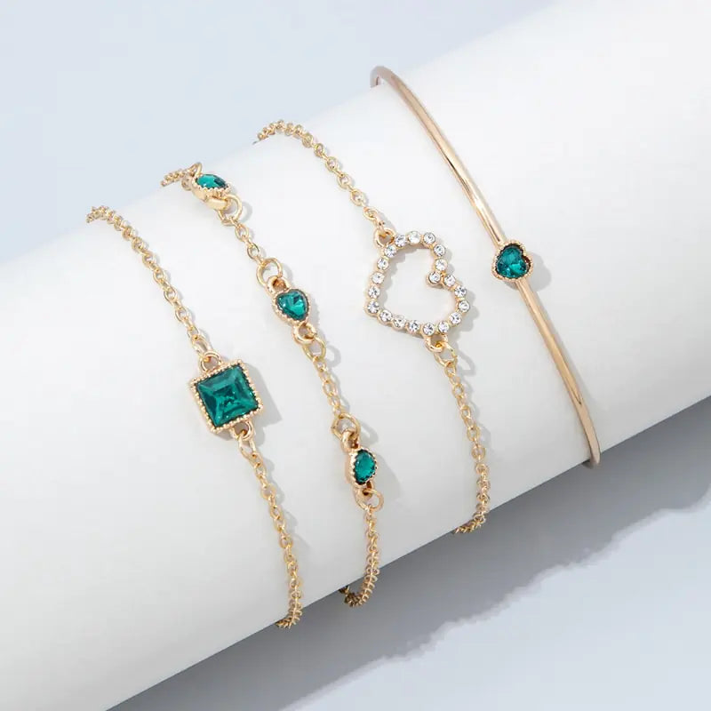 Gold inlaid bracelet jewelry set by Lamp Post featuring intricate design and elegant craftsmanship.