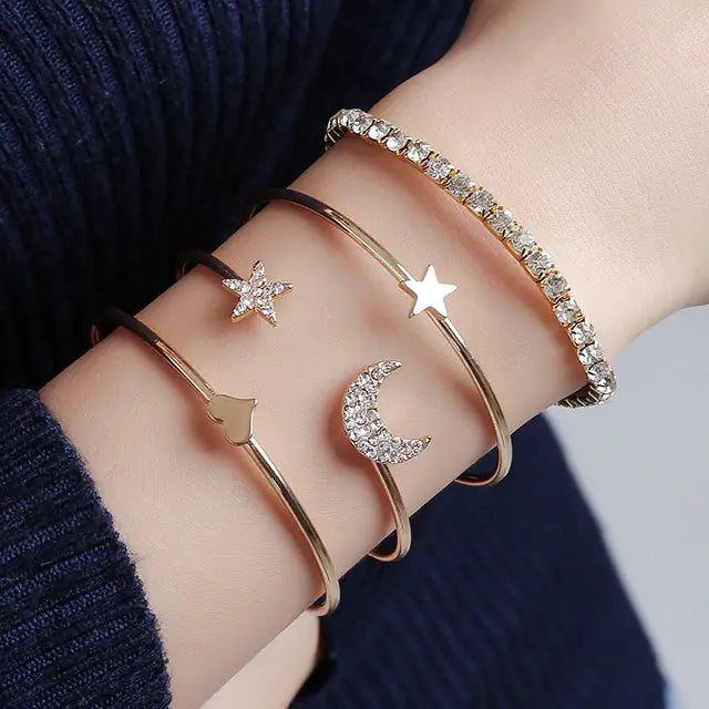 Gold inlaid bracelet jewelry set by Lamp Post featuring intricate design and elegant craftsmanship, displayed on a neutral background.