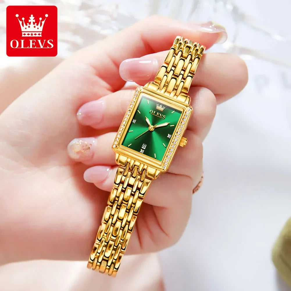 OLEVS 9995 elegant quartz ladies wristwatch with gold and silver tones, luminous dial, date display, waterproof, luxury design.