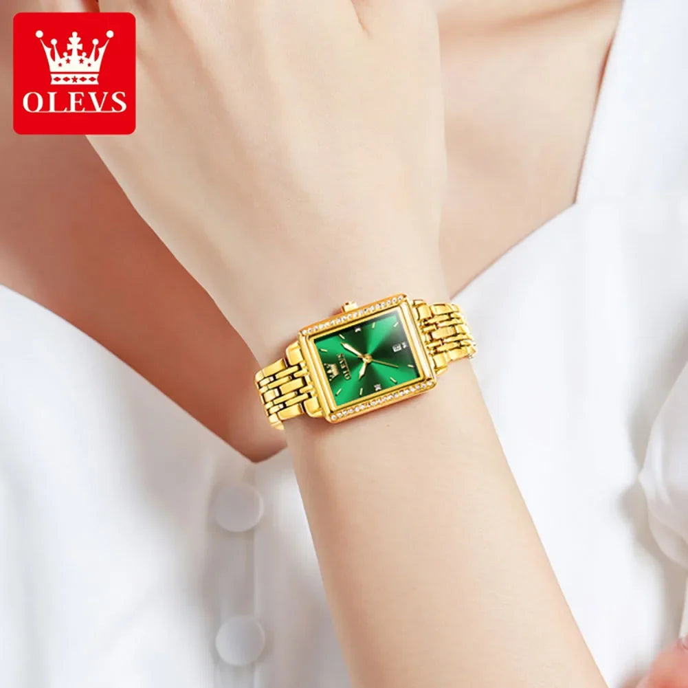 OLEVS 9995 elegant quartz ladies wristwatch with gold and silver tones, luminous dial, date display, waterproof design, luxury style.