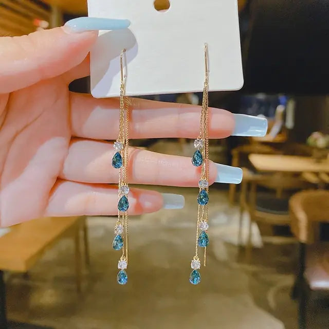 Gold flower earrings set by Lamp Post featuring delicate floral design and elegant style for versatile wear.