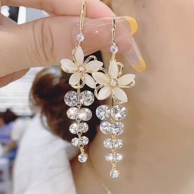 Gold flower earrings set by Lamp Post featuring delicate floral design and elegant craftsmanship, perfect for stylish accessories.