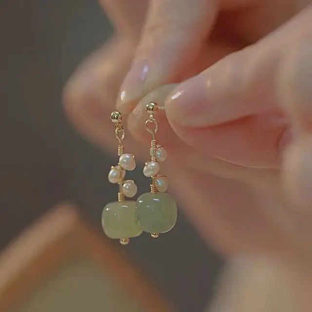 Gold flower earrings set by Lamp Post featuring delicate floral design and elegant jewelry for stylish accessories.