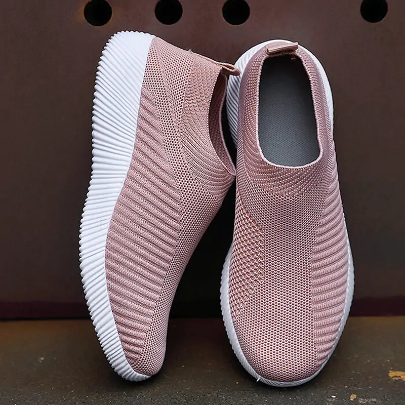 Gray women's sneakers by Lamp Post featuring a sleek design and comfortable fit, perfect for casual wear.