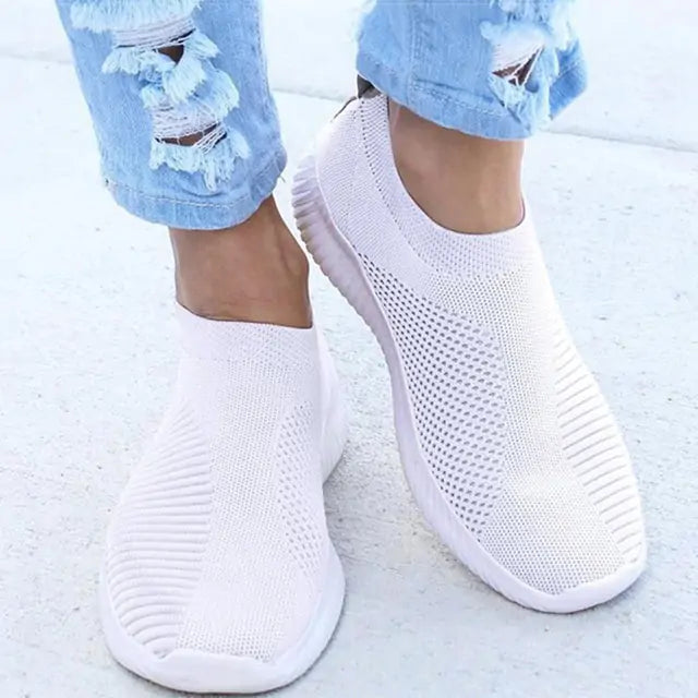 Gray women's sneakers by Lamp Post featuring a comfortable design and stylish casual look.