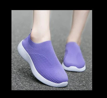 Gray women's sneakers by Lamp Post featuring stylish design and comfortable fit, perfect for casual wear.