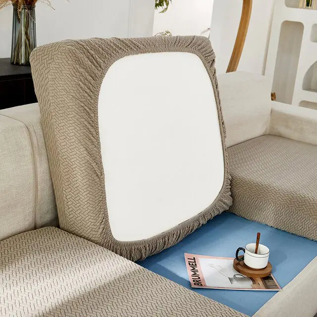 Green Lamp Post universal sofa cover draped over a sofa with back cushions, protective and stylish for furniture protection.
